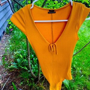 Out from under body suit size medium